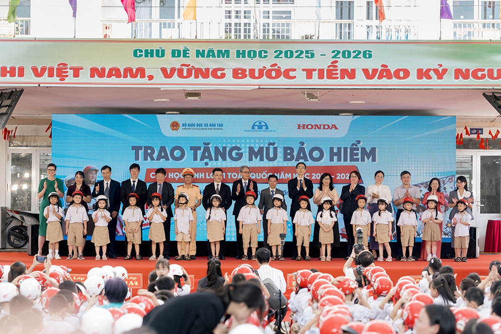 honda trao tang mu bao hiem cho hoc sinh lop 1 toan quoc hinh anh 2
