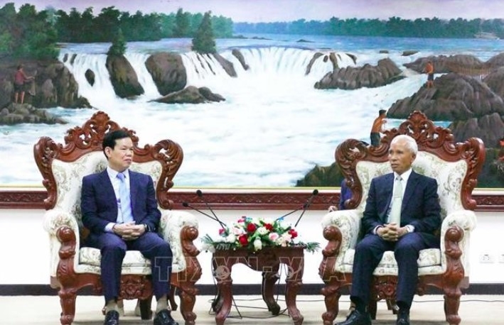 party commissions of vietnam, laos strengthen cooperation in communications picture 1