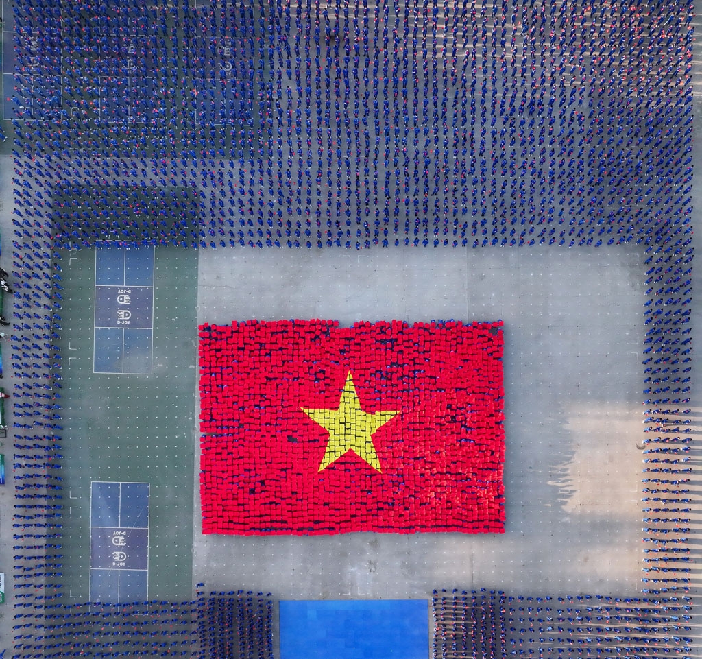 60.000 hoc sinh tao ky luc kep viet nam va the gioi voi vo nhac vovinam hinh anh 7