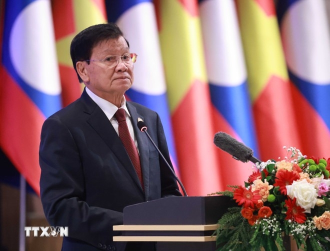tong bi thu to lam va phu nhan du chieu dai cap nha nuoc tai lao hinh anh 2