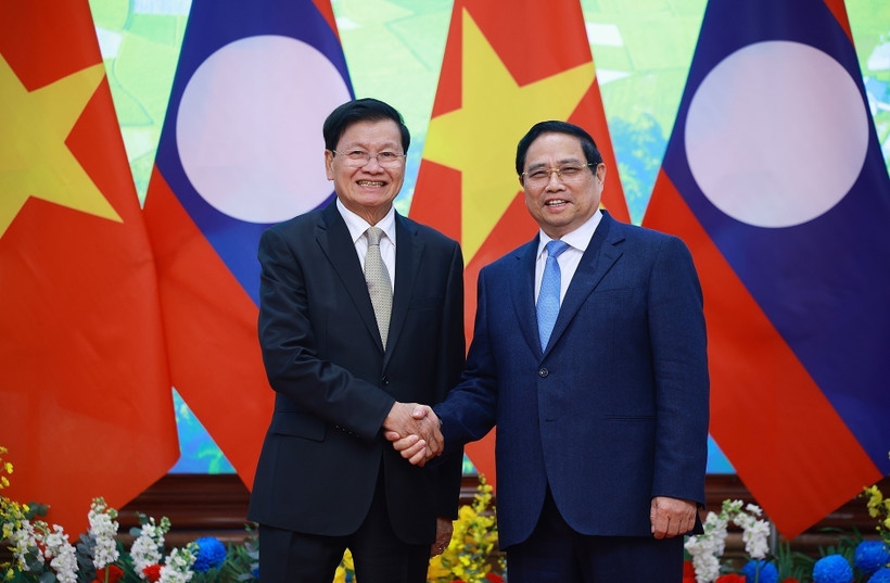 prime minister welcomes lao party general secretary and president in hanoi picture 1