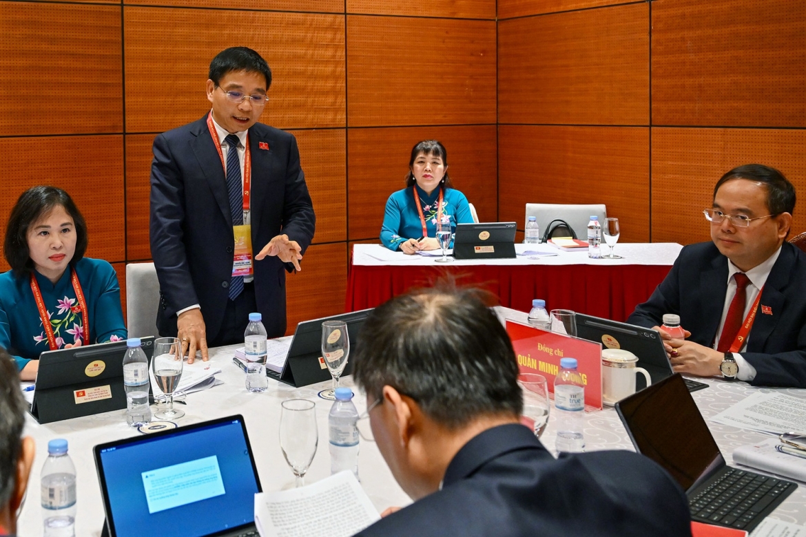 Dai bieu thao luan tai doan ve van kien trinh Dai hoi xiv cua Dang hinh anh 21