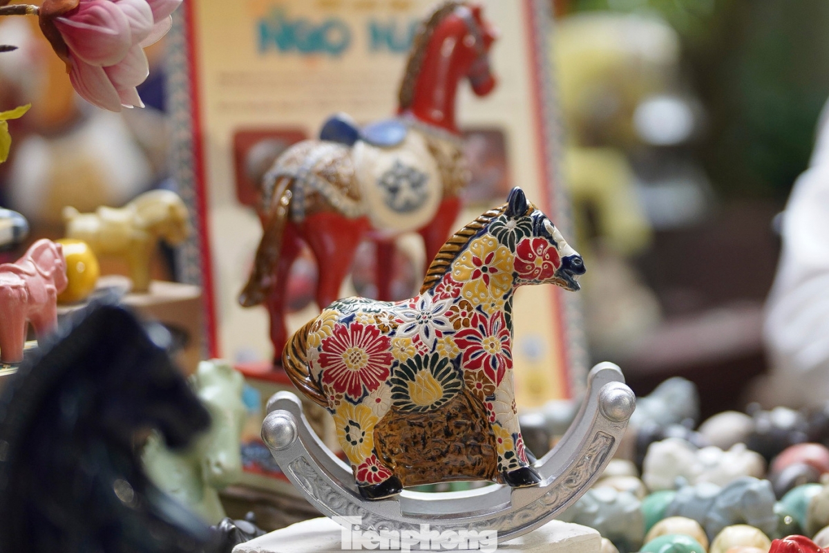 a closer look at a unique collection of ceramic horses for tet picture 9