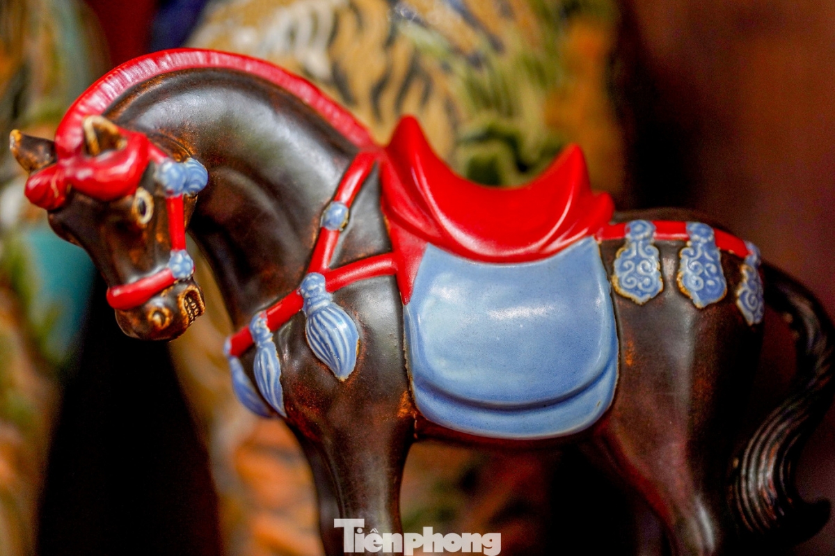 a closer look at a unique collection of ceramic horses for tet picture 12