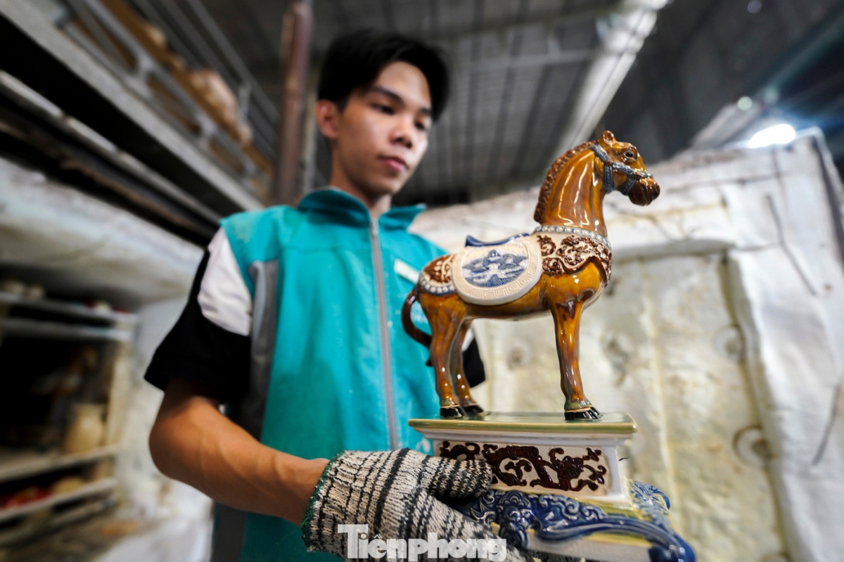 a closer look at a unique collection of ceramic horses for tet picture 15