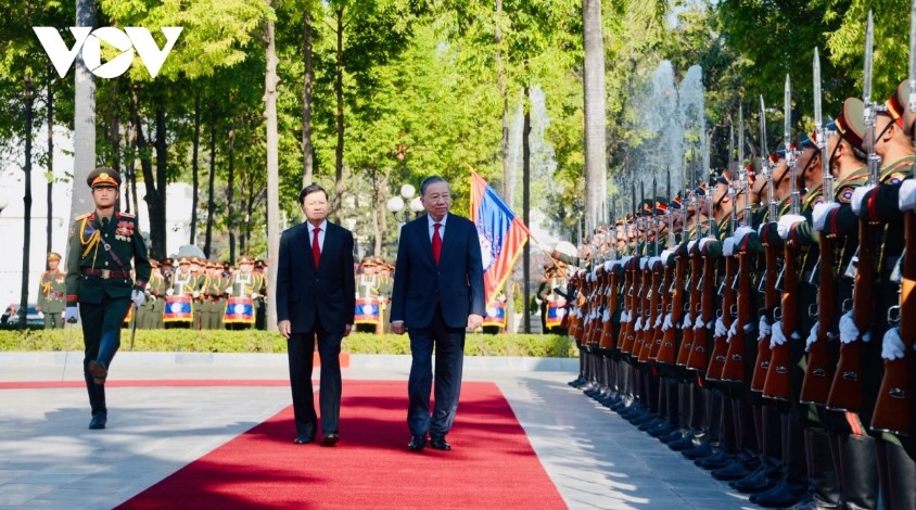 top lao leader hosts official welcome ceremony for party chief to lam picture 2