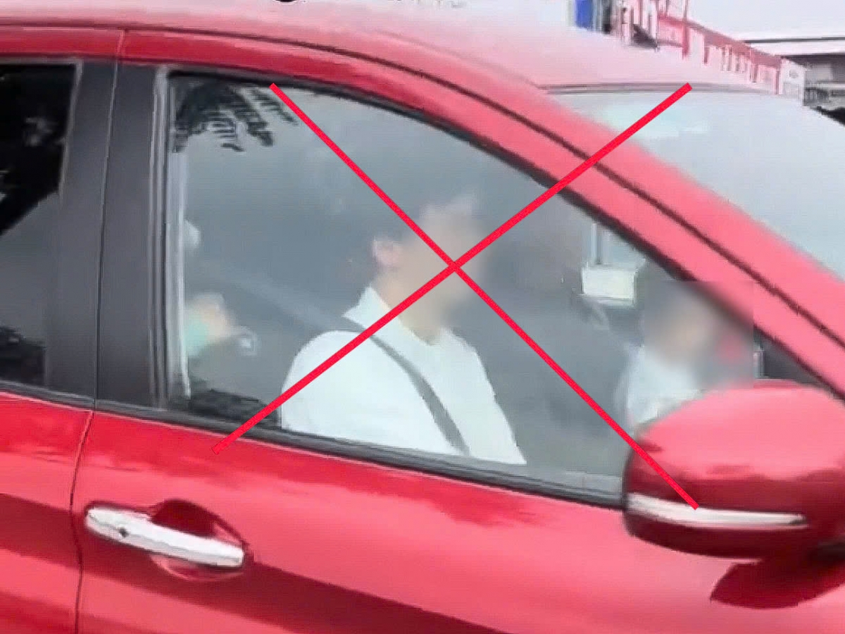 Công an Hà Nội xử phạt tài xế cho trẻ em ngồi cùng ghế lái khi đang điều khiển xe