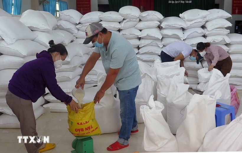over 14,660 tonnes of rice allocated to localities during tet, between-crop period picture 1