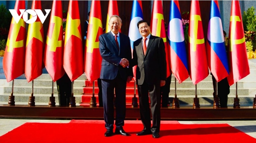 top lao leader hosts official welcome ceremony for party chief to lam picture 4