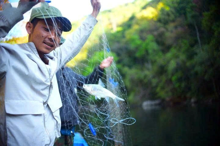 Spring hunt: K’Ho people brace cold streams for legendary fish
