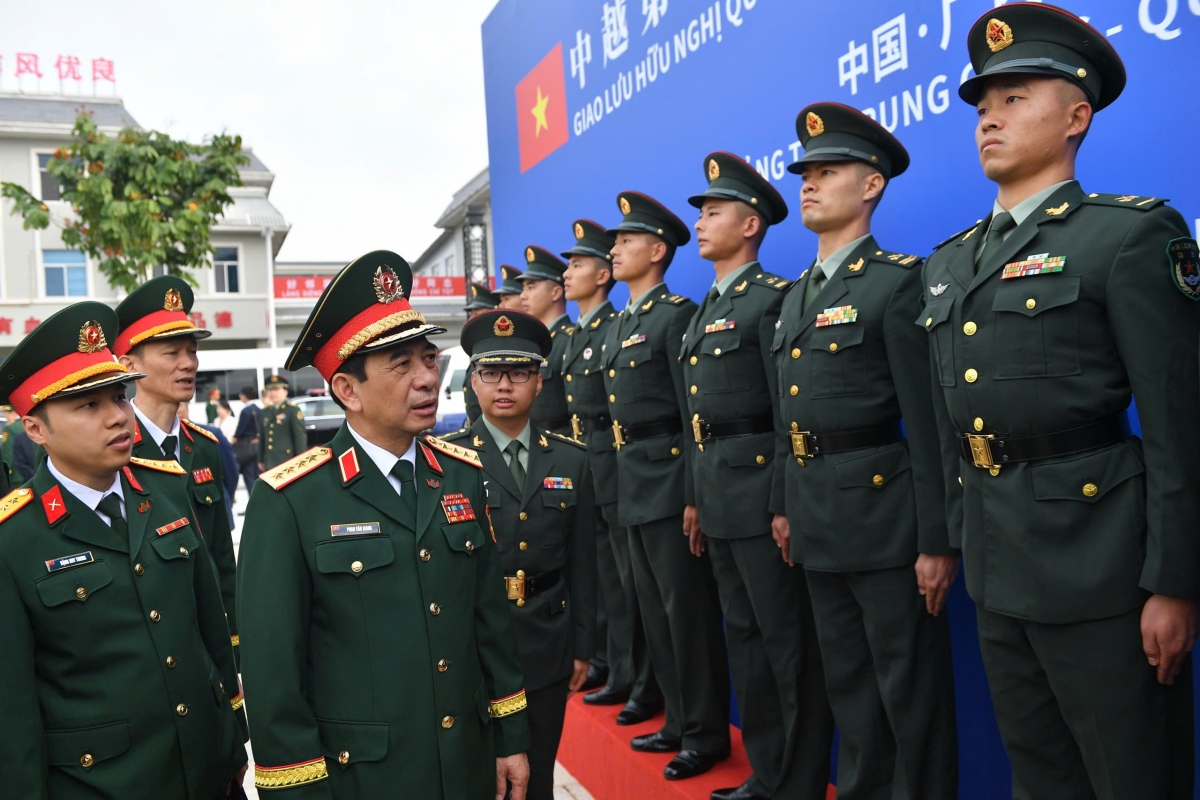 Dai tuong phan van giang va Doan dai bieu viet nam sang tham du nhieu hoat dong tai trung quoc hinh anh 11