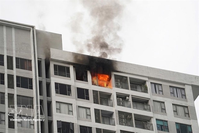 hcm city tightens enforcement over blocked apartment fire exits picture 1