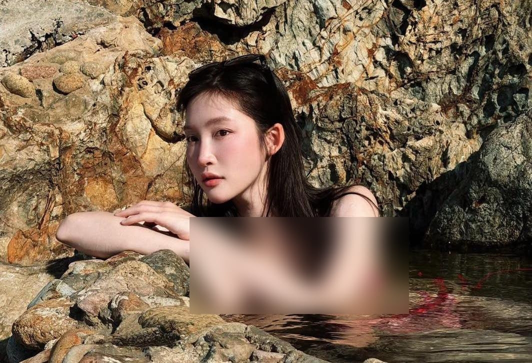 juky san xin loi sau on ao chup anh bikini tai gieng tien hinh anh 1