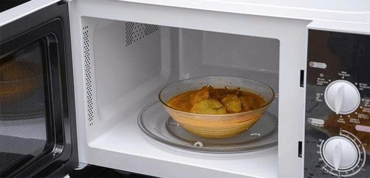 ham lai thuc an thua lam sao de an toan ma van ngon nhu moi hinh anh 1