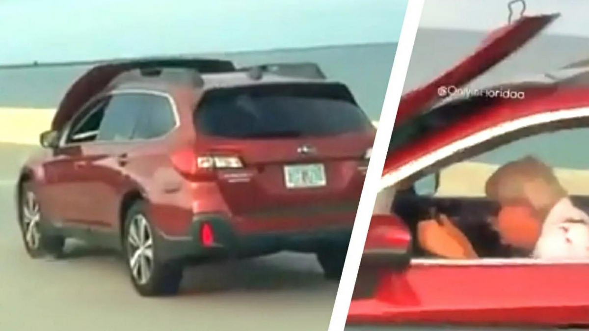 subaru outback gap su co nap ca-po bat tung khi dang chay, tai xe van tiep tuc lai hinh anh 1