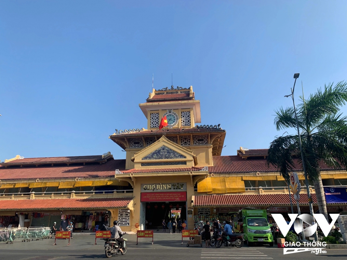 cho binh tay, in dau mot sai gon xua hinh anh 1