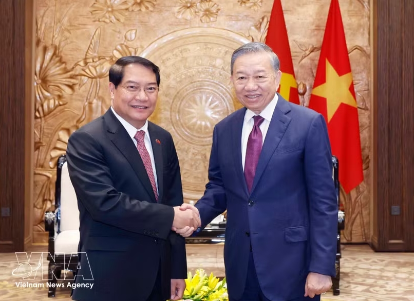 top leader of vietnam receives vientiane official in hanoi picture 1