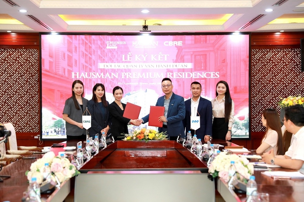 flc hop tac cbre van hanh hausman premium residences truoc them ban giao hinh anh 1