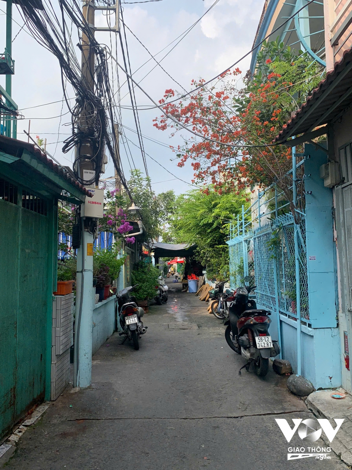 tet Doan ngo - ghe tham xom banh u hon nua the ky giua sai gon hinh anh 1