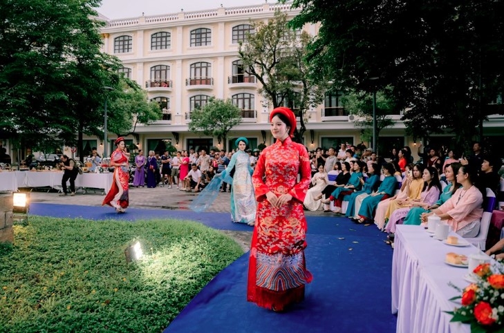 hue stages exhibition and performance on ao dai tailoring and dressing heritage picture 1