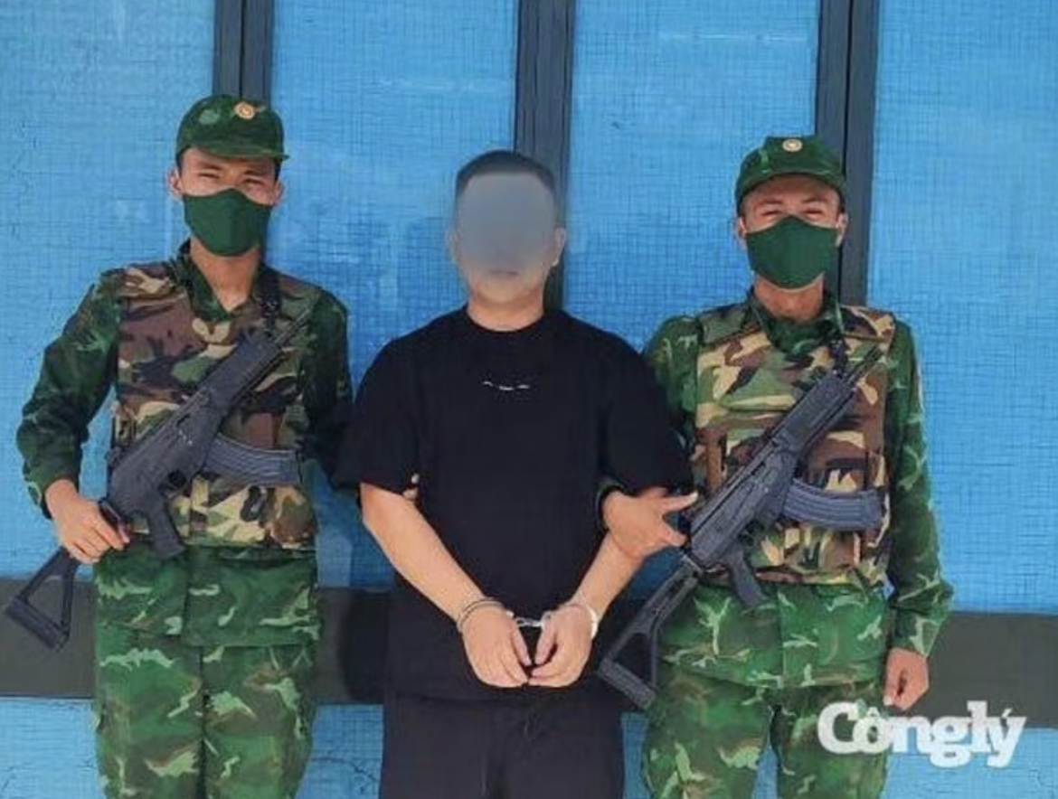 chinese fugitive arrested at moc bai border gate exiting to cambodia picture 1