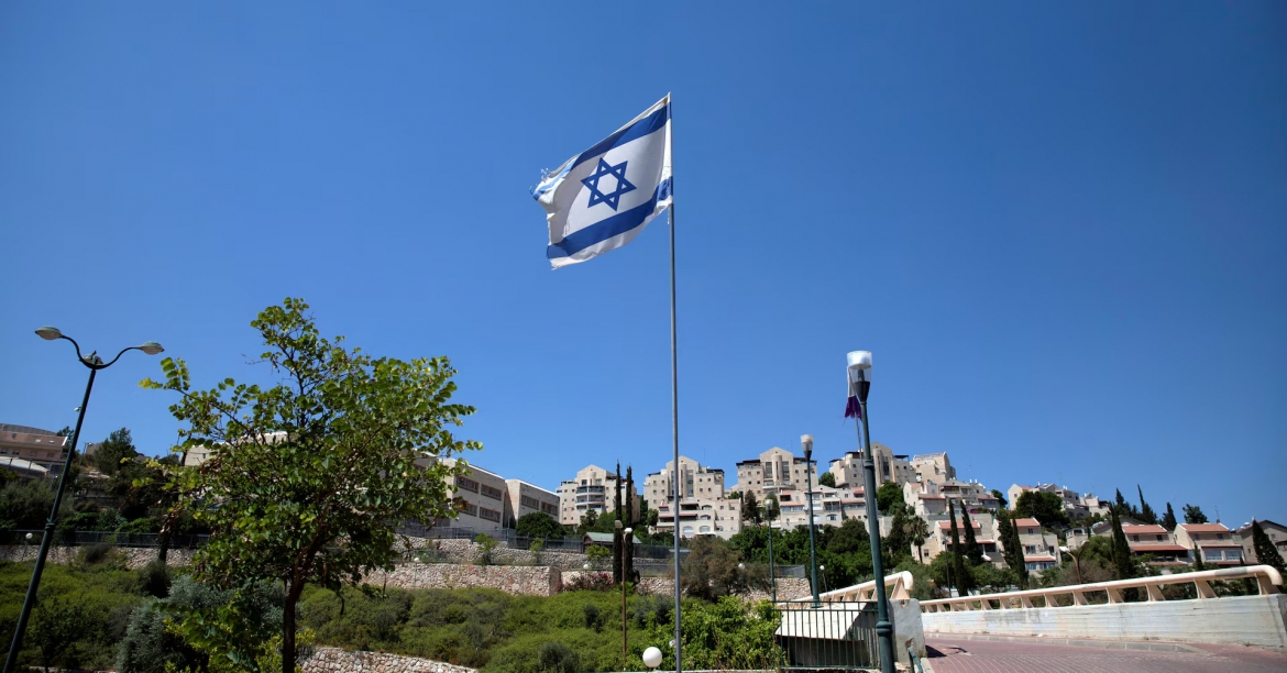 israel mo lai khu dinh cu o bo tay, bao luc tiep tuc gia tang hinh anh 1