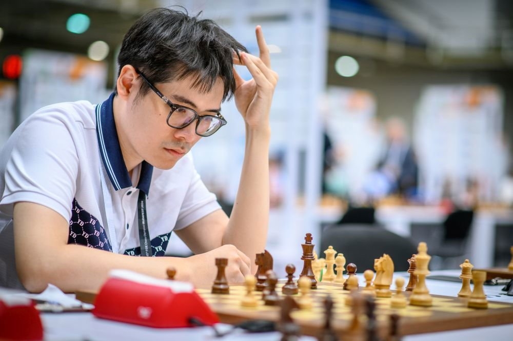 gm le tuan minh beats world no. 3 nakamura to win online blitz title picture 1