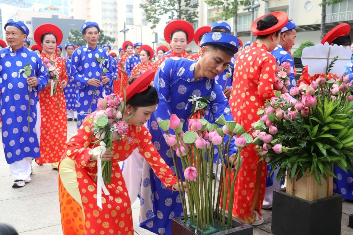 52 couples tie the knot at mass wedding in hcm city picture 2