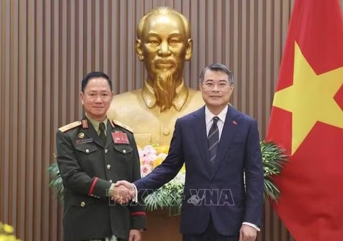 thu tuong tiep pho thu tuong, bo truong quoc phong lao hinh anh 1