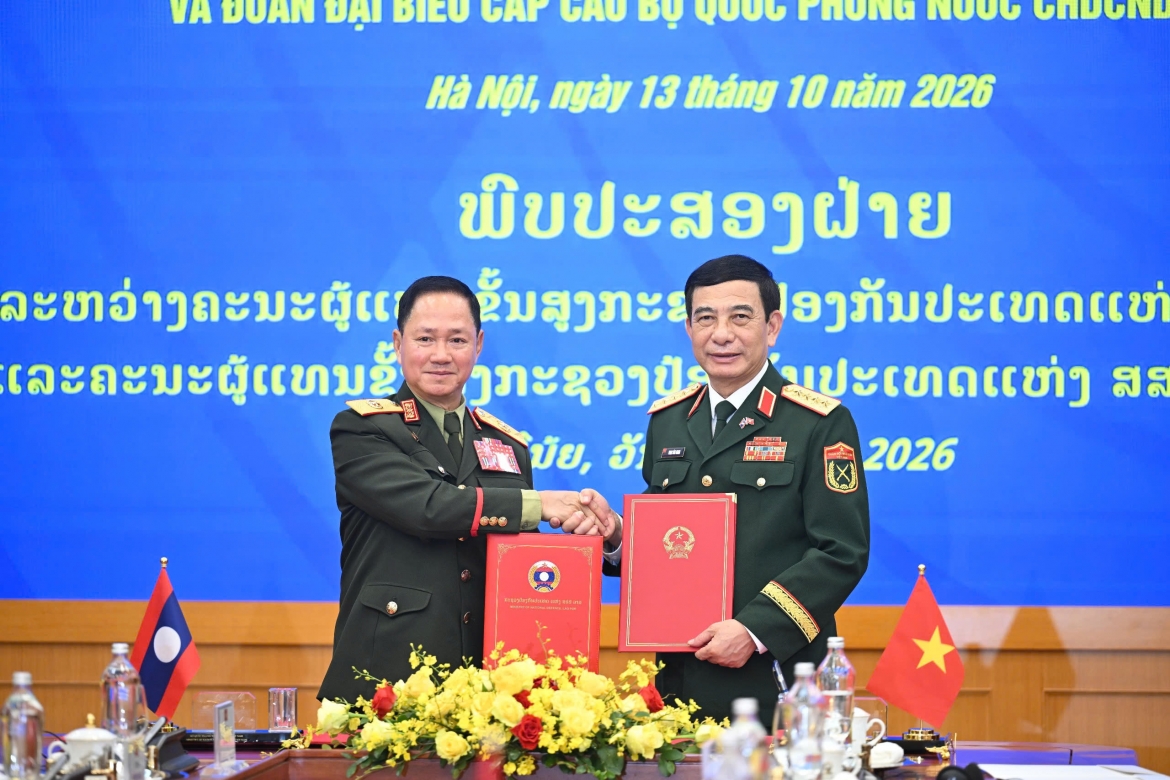 Dai tuong phan van giang chu tri le don pho thu tuong, bo truong bo quoc phong lao hinh anh 11