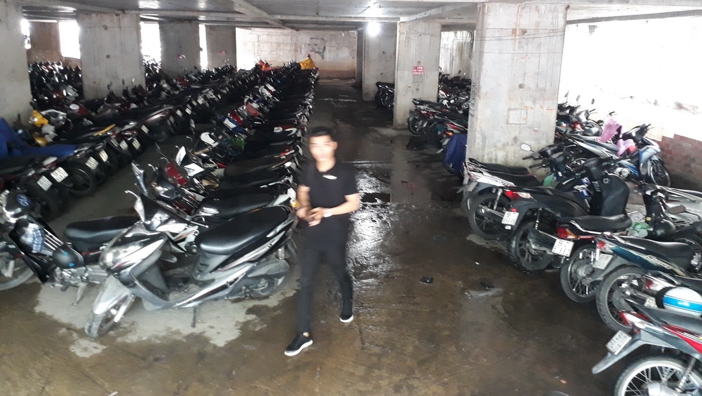 HCM City buildings combat flooded parking basements