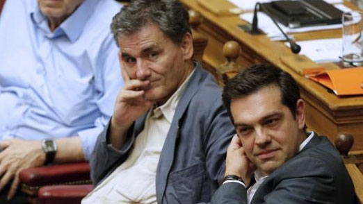 Greek parliament approves bailout measures as Syriza fragments