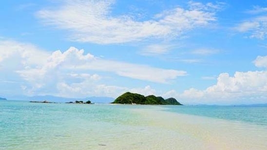 Wading across the sea in Diep Son Island