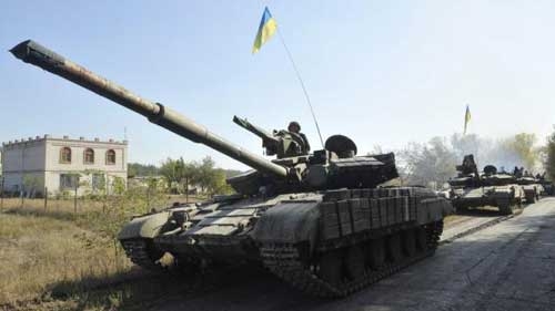 Ukraine starts pull-back of tanks, light artillery in east: military