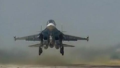 Russian air strikes kill at least 30 in stepped up raids in northwest Syria