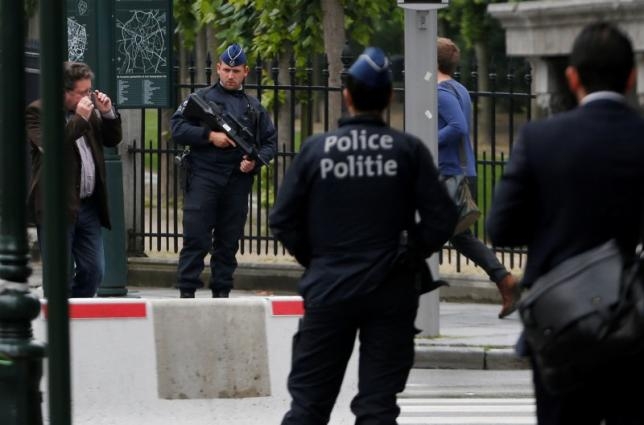 Belgium charges three men with terrorism offences after overnight raids