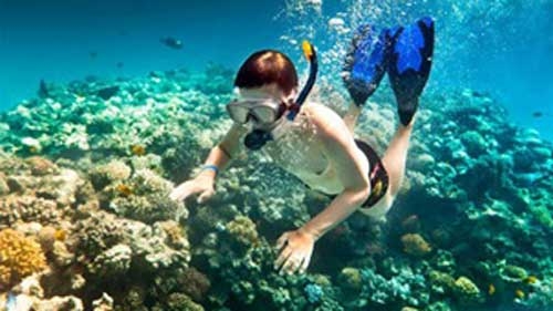 Pristine beaches, reefs entice tourists