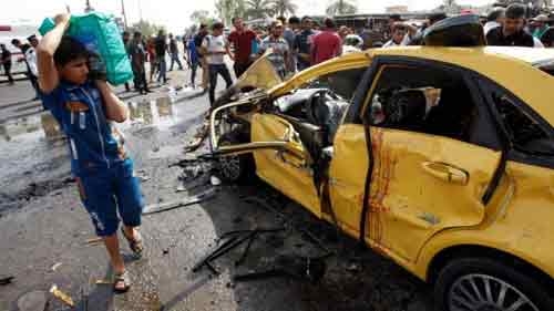 After bombings in Baghdad kill 77, Sadr's forces deploy in some areas