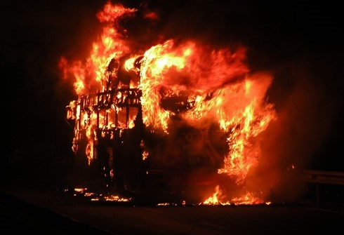 Bus reduced to charred metal after catching fire in central Vietnam