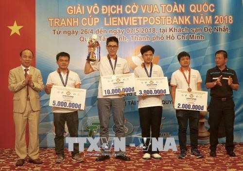 Minh wins two titles at national chess tourney