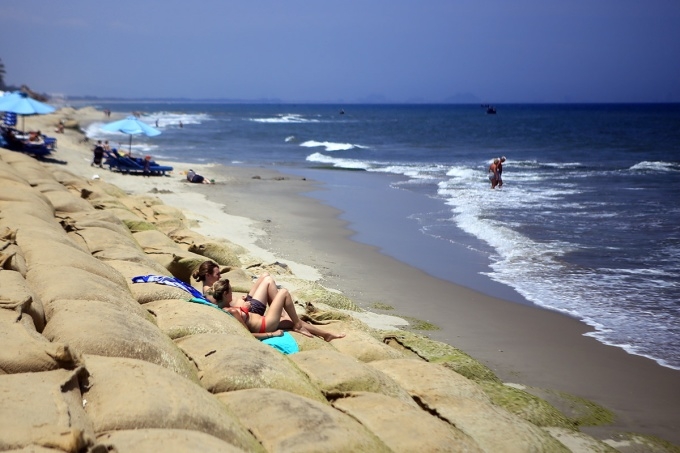 Sand mining ban needed to rescue Hoi An from watery grave