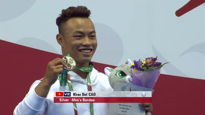 Dat brings home a world wushu silver