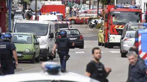 Islamists attack French church, slit priest's throat