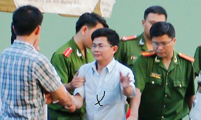 Vietnam jails whistleblower linked to bribery case