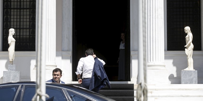 Greek faces tough conditions under deal with euro zone