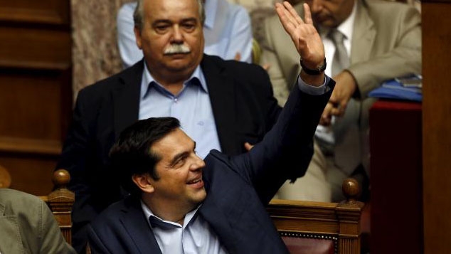 Triumphant Tsipras returns to fight for Greek economy, debt relief