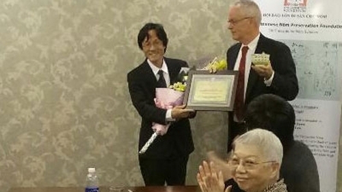 Japanese professor honoured for helping to preserve Nom script