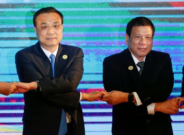 Tensions over South China Sea belie summit cordiality