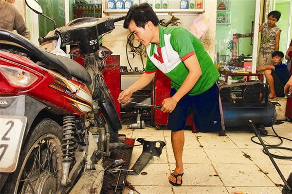 A kind-hearted motorbike service shop owner