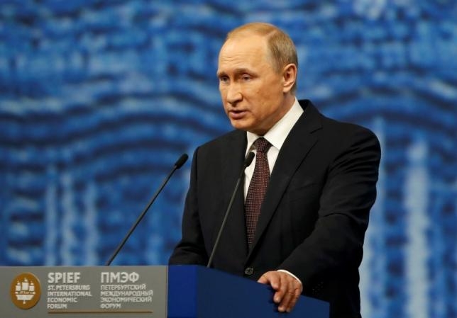 Putin says accepts US is sole superpower, dilutes Trump praise